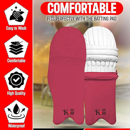 Red protective pad with white batting pad on top, featuring comfort and quality attributes.